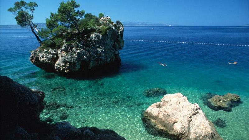 Lonely island along Makarska Riviera shoreline